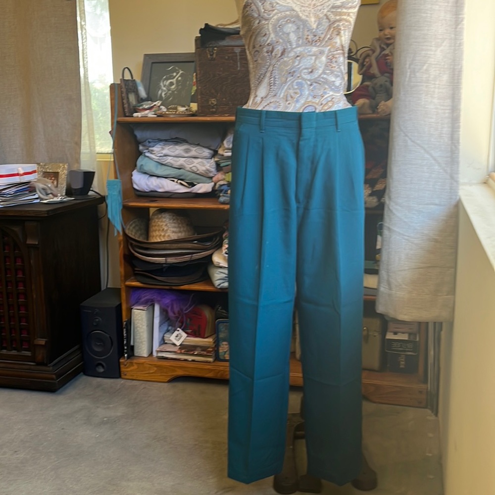 Rockabilly style vintage high waisted teal Free Fall slacks.